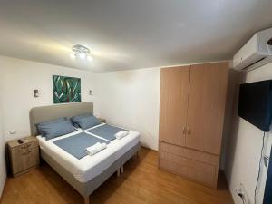 Ένα ή περισσότερα κρεβάτια σε δωμάτιο στο Holiday Home Traum