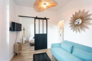 Μια τηλεόραση ή/και κέντρο ψυχαγωγίας στο Appartement Brive Centre Historique