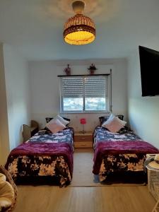 Gallery image of Quarto completo tranquilo e sossegado in Mercês