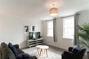 Televiisor ja/või meelelahutuskeskus majutusasutuses Modern 1 Bed Harbour-side Apartment in Whitehaven