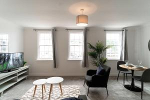 Televiisor ja/või meelelahutuskeskus majutusasutuses Modern 1 Bed Harbour-side Apartment in Whitehaven