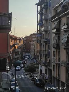 a view of a city street with cars and buildings at Davide Host LH89, 30min Duomo in Sesto San Giovanni +31 photos