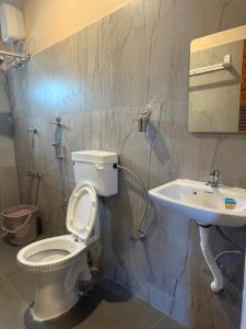 Koupelna v ubytování French Resort