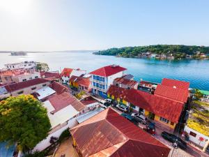 an aerial view of a town next to the water at Hotel Casazul in Flores