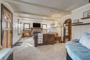 a living room with a couch and a fireplace at 4 Bdrm Amazing Veiws in Cascade-Chipita Park