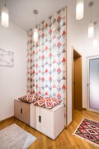 Postel nebo postele na pokoji v ubytování Alexandra's City Center Apartment I