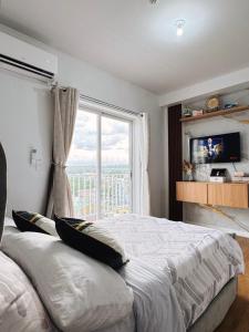 Katil atau katil-katil dalam bilik di Casa Dela Staycation - Mesatierra
