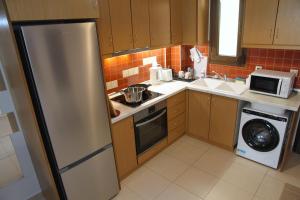 Η κουζίνα ή μικρή κουζίνα στο SiviriLovelyApartment +45 φωτογραφίες