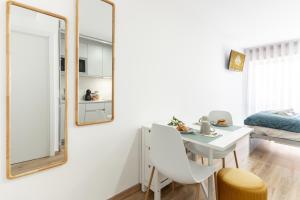 Ένα ή περισσότερα κρεβάτια σε δωμάτιο στο Lotus