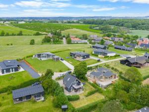 an aerial view of a large estate with houses at Holiday Home Chayton - 450m from the sea by Interhome in Fåborg