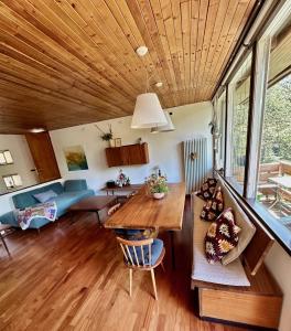 Posezení v ubytování Ca' Mugo, chalet immerso nel bosco