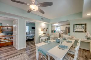 a dining room and living room with a table and chairs at 214-216 Pearl Entire House in Fort Myers Beach