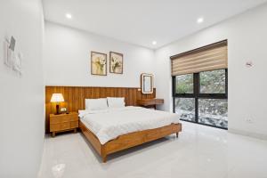 Ένα ή περισσότερα κρεβάτια σε δωμάτιο στο Aika Garden +23 φωτογραφίες