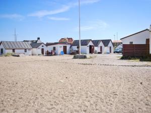 El barrio en el que está la casa vacacional o un barrio cercano