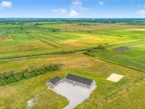 an overhead view of a building in a field at Holiday Home Etje - 6km from the sea by Interhome in Ulfborg