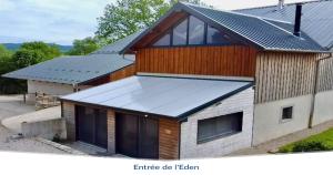 a house with a solar roof on top of it at Les Bouloies - 2 gites familiaux l'Eden et les Saules - in Laviron +29 photos