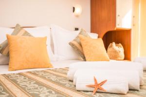 Postel nebo postele na pokoji v ubytování Hotel Oregon