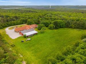 an aerial view of a house in a field at Holiday Home Wilmar - 1km to the fjord by Interhome in Vemb