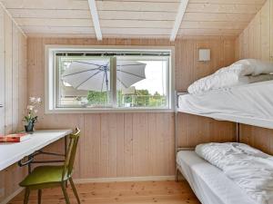 Postel nebo postele na pokoji v ubytování Holiday Home Tashina - 200m from the sea by Interhome