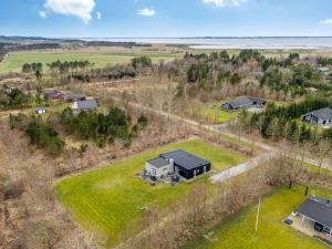 an aerial view of a house on a grass field at Holiday Home Jarven - 500m to the fjord by Interhome in Højslev