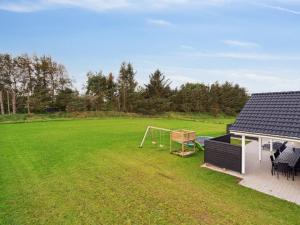 an aerial view of a large yard with a goal at Holiday Home Sibbe - 500m to the fjord by Interhome in Spottrup