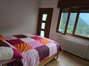Postel nebo postele na pokoji v ubytování Al Belvedere sul Piave
