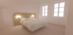 a white bedroom with a bed and two windows at Mustard Hostel in Dijon