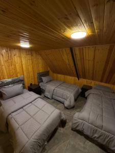 Ένα ή περισσότερα κρεβάτια σε δωμάτιο στο Abeer cabin