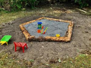 Ο χώρος παιχνιδιού για παιδιά στο Holiday Home Jakko - 300m from the sea by Interhome