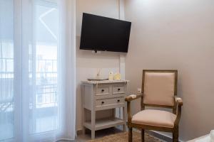 TV a/nebo společenská místnost v ubytování 8kto Studio