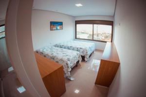 Una cama o camas en una habitación de WL escarpas Paraiso 47 fotos más