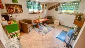 an overhead view of a living room with a table and chairs at Villa Felicity in Nová Lesná