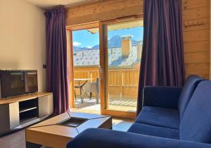 Ruang duduk di Crépines Appartement 2 à 4 personnes au pied des pistes