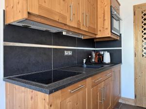 Dapur atau dapur kecil di Crépines Appartement 2 à 4 personnes au pied des pistes