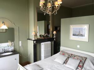 Postel nebo postele na pokoji v ubytování Huis Vandermersch