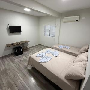 Ένα ή περισσότερα κρεβάτια σε δωμάτιο στο Hotel Vida Boa +17 φωτογραφίες