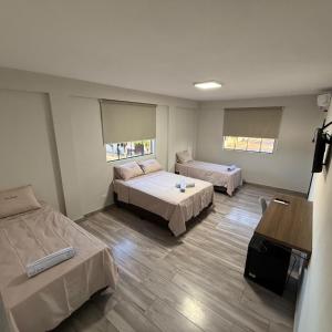 Ένα ή περισσότερα κρεβάτια σε δωμάτιο στο Hotel Vida Boa