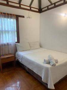 Postel nebo postele na pokoji v ubytování Apartamento Centro Histórico Villa de Leyva + 8 fotografií