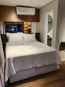 Postel nebo postele na pokoji v ubytování Flat exclusivo Studio Cuiabá 908