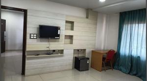 Η κουζίνα ή μικρή κουζίνα στο Hotel Kasturi International