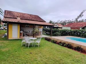 Πισίνα στο ή κοντά στο Casa de Praia - LONG BEACH - Cabo Frio - Unamar