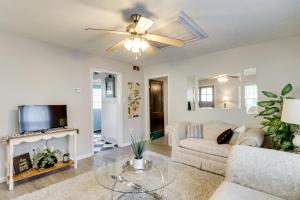 a living room with a couch and a tv at Home Less Than 3 Mi to Rte 66 and Lake Lou Yaeger! in Litchfield