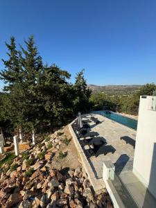 Bazén v ubytování Villa & Apartament Armonia 1 Sol Ignis Gavalochori-Vamos KRETA nebo v jeho okolí