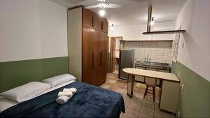 Postel nebo postele na pokoji v ubytování Residencial Alfa