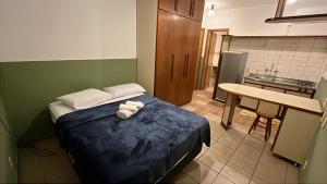 Postel nebo postele na pokoji v ubytování Residencial Alfa