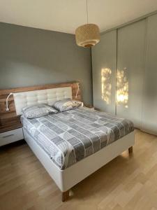 Postel nebo postele na pokoji v ubytování La campagne près de la ville