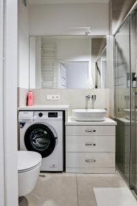 Ένα μπάνιο στο Apartament Różany
