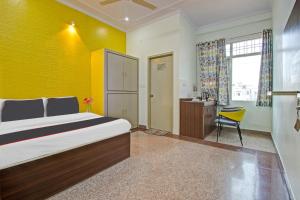 Postel nebo postele na pokoji v ubytování Hotel O Reyansh + 23 fotografií