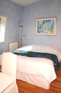 Ένα ή περισσότερα κρεβάτια σε δωμάτιο στο 52 Clichy Bed & Breakfast - Chambre d'hôtes