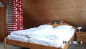 Postel nebo postele na pokoji v ubytování Gemütliches Ferienhaus In Breitenbach